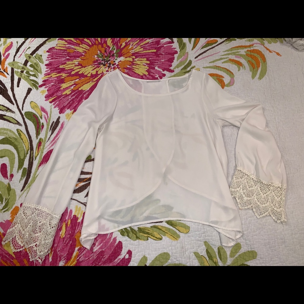 Super cute open back top with crochet sleeves